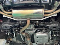 Rear Lower Strut Brace 2 Points White Steel Toyota Yaris Ultra Racing